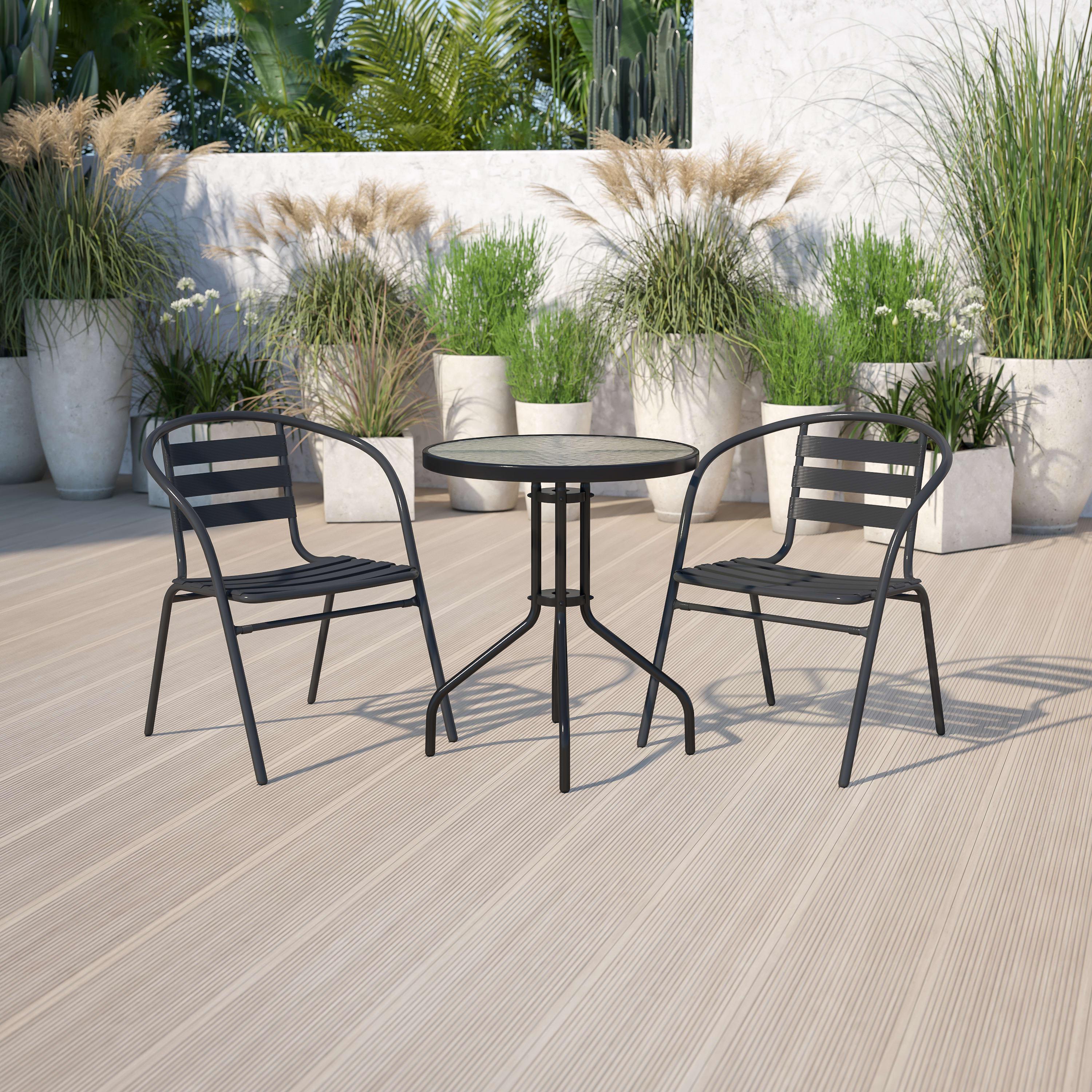 Round glass patio hot sale table and chairs