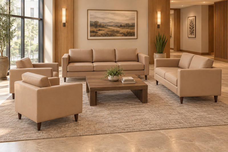 Bizchair-horizontal-hotel-lounge-with-tan-sofa-loveseat-and-two-chairs-arranged-around-a-coffee-table